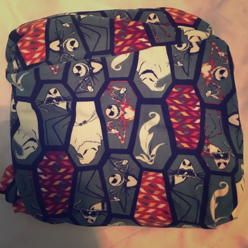 EUC LulaRoe Disney NBC Leggings Multi Character